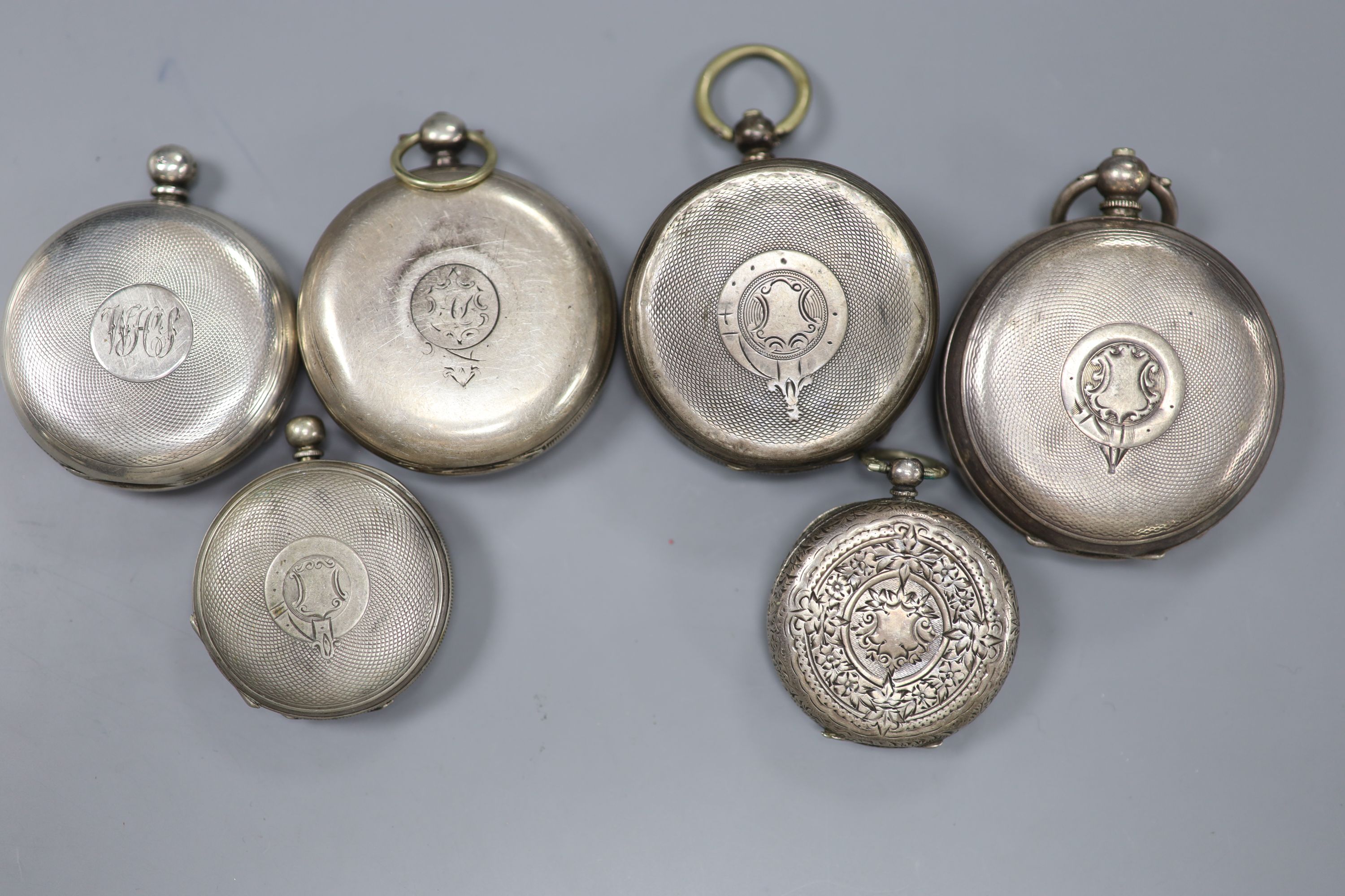 Three assorted silver pocket watches, a white metal pocket watch and two similar fob watches (a.f.).